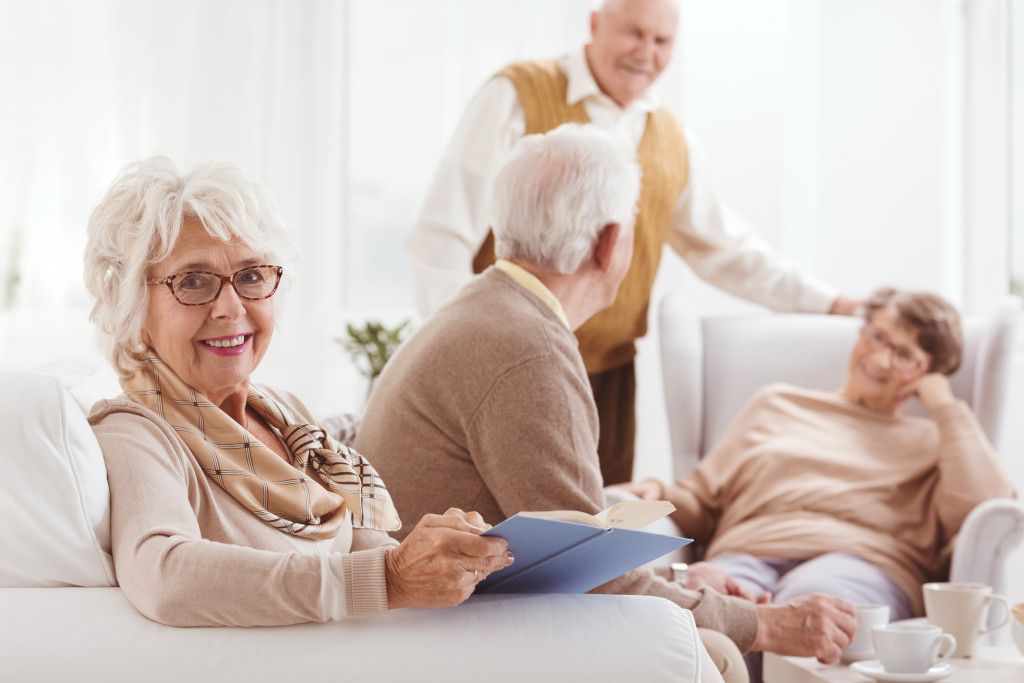 old woman looking at the camera smiling