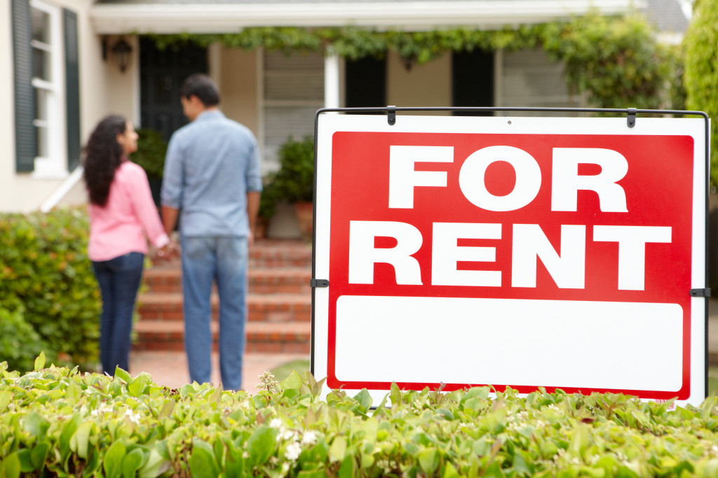 couple looking at the house for rent