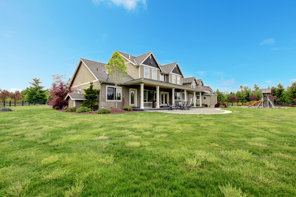 clean and beautiful curb appeal of a traditional big home