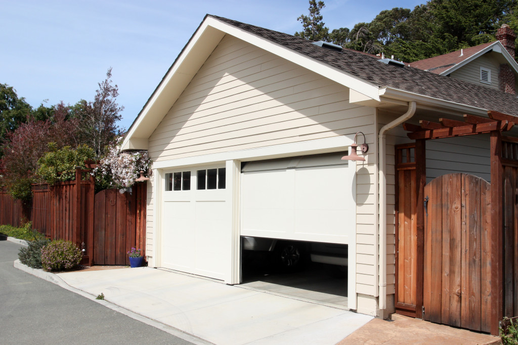 view of a minimalist garage door half-open