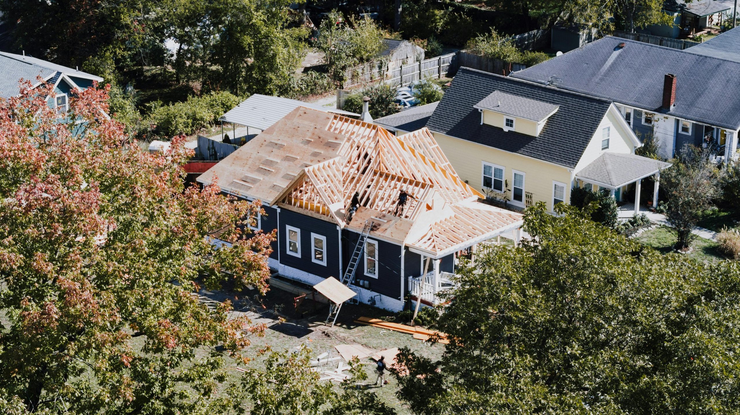 house under construction with exposed roof framing
