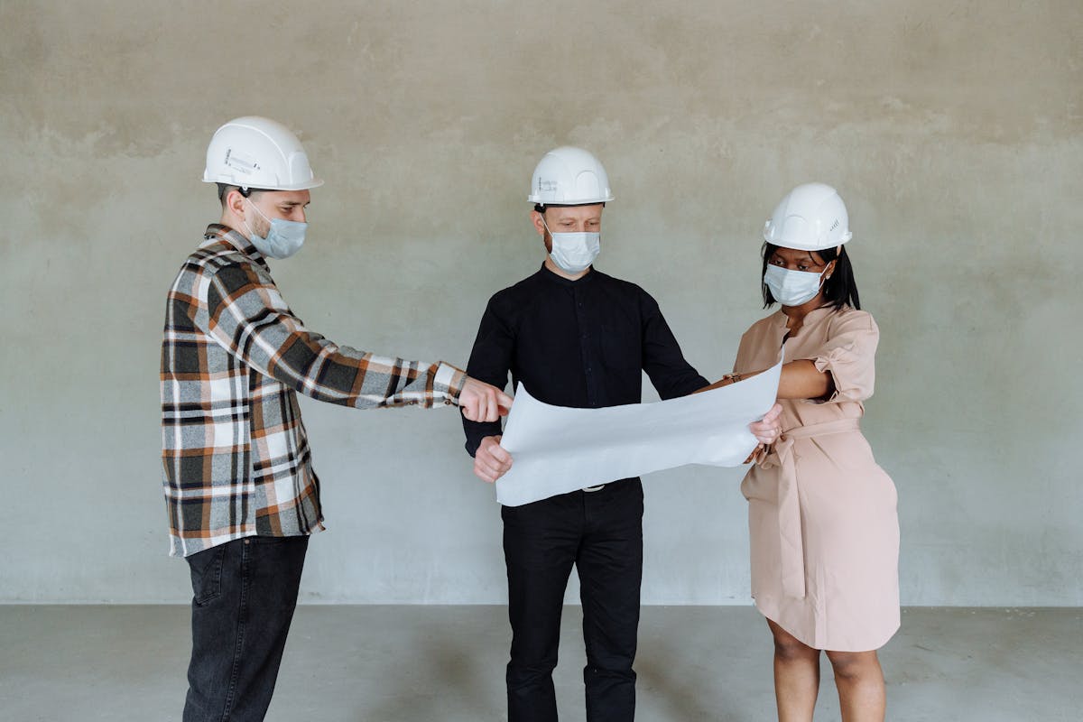 contractors and developers looking at a plan